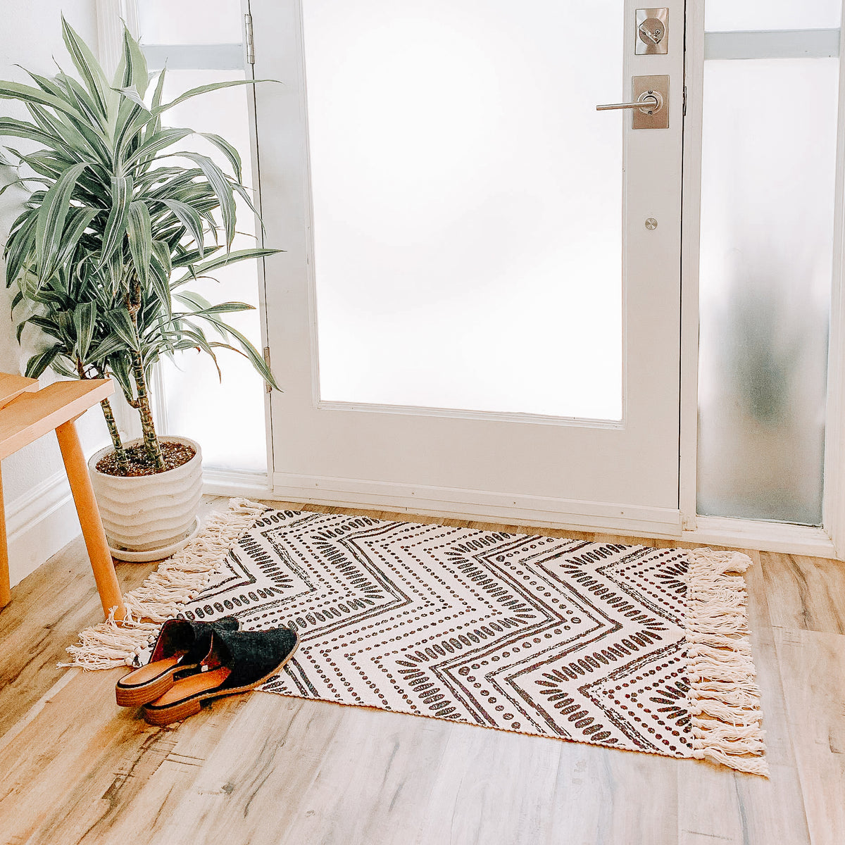 Black + White Wavy Printed Layering Rug