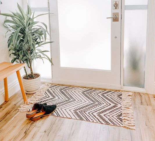 Black + White Wavy Printed Layering Rug